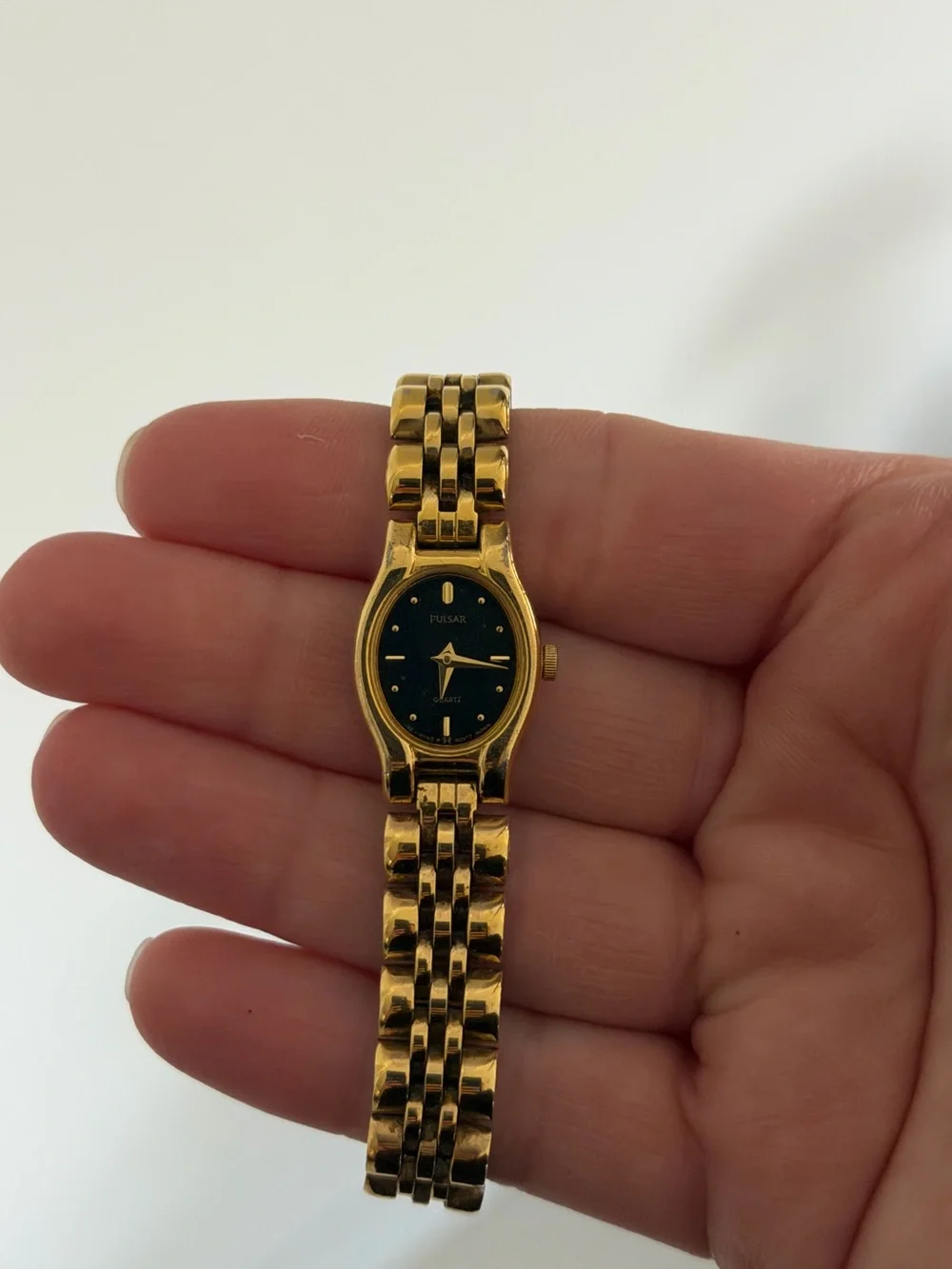 Vintage Pulsar Gold-Tone Watch with Black Dial